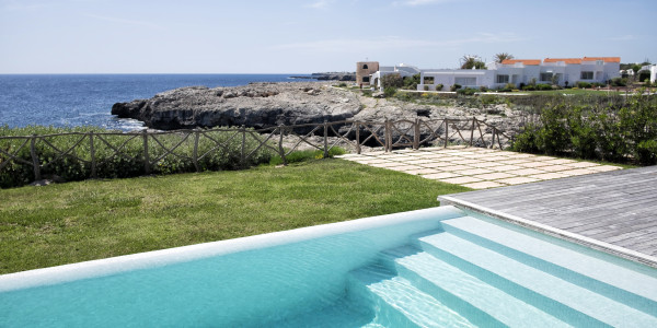 Compraventa de Inmuebles en Les Corts · Casas de Playa